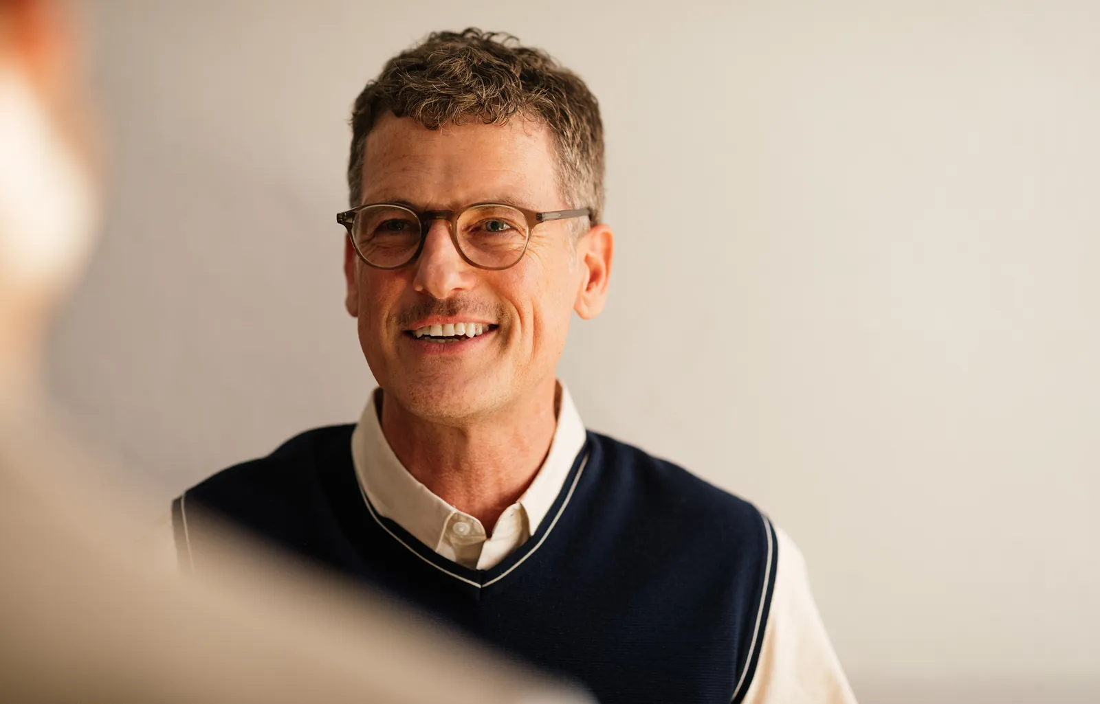 A smiling clinician